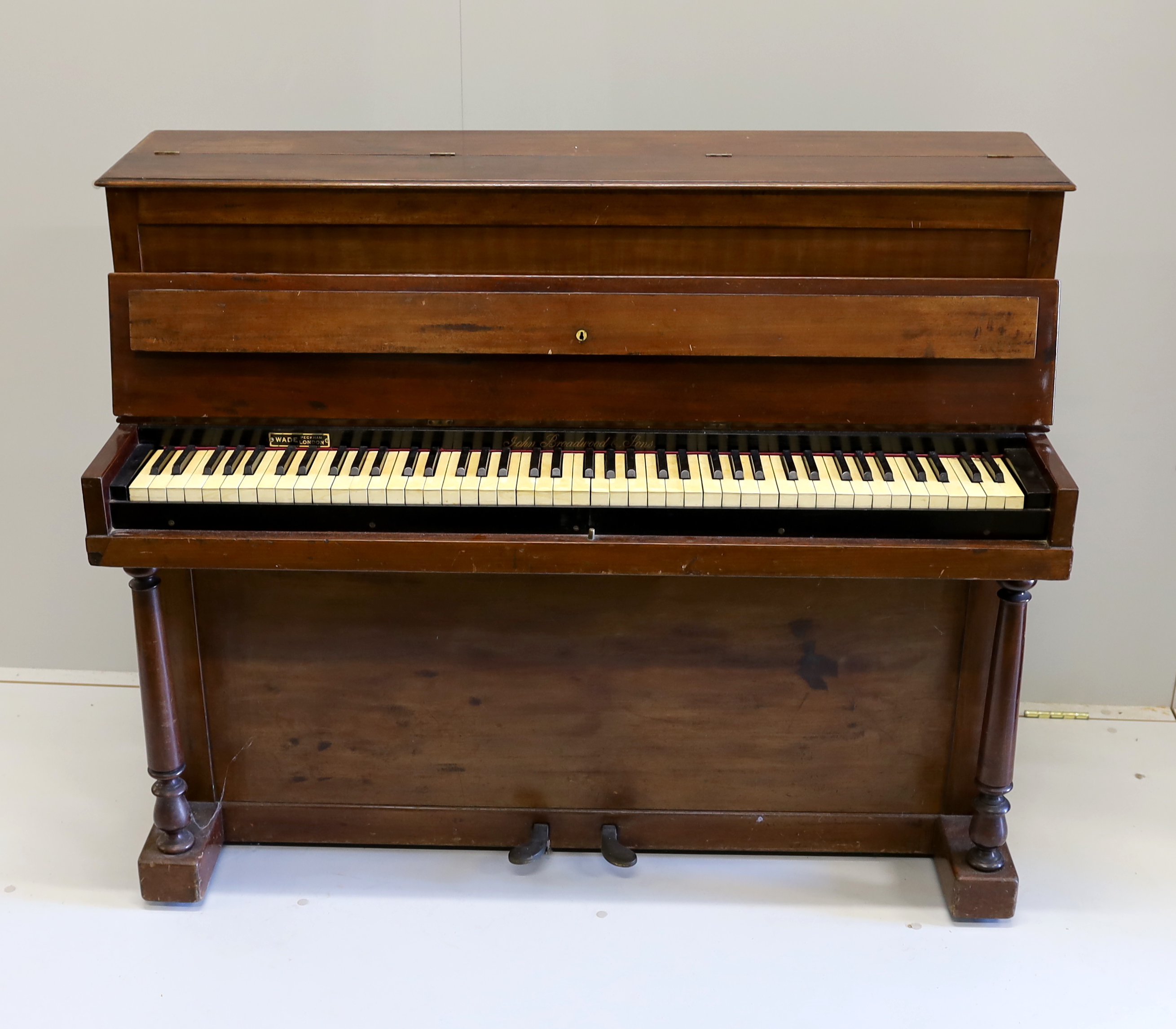 A John Broadwood & Sons upright piano, formerly the property of Sir Arthur Sullivan, a mahogany pianette model no.22 with 82 keys built in 1867